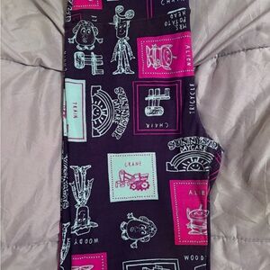 LuLaRoe Black and Pink Graphic Leggings